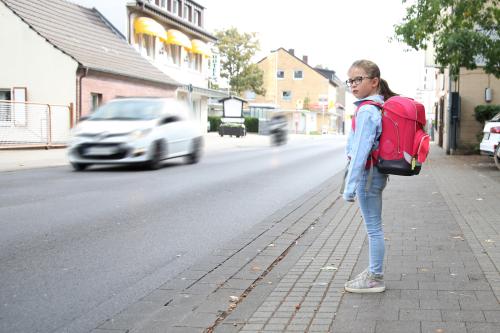 Girl crossing the street